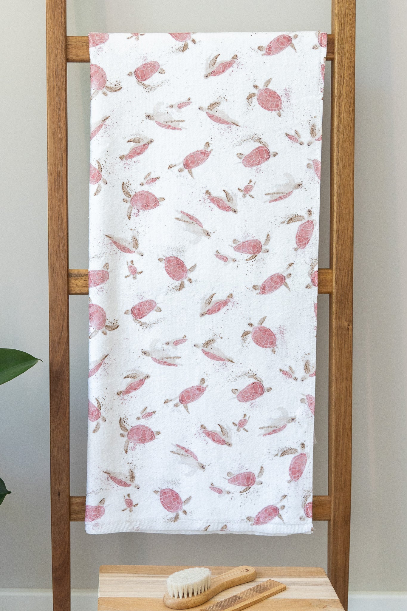 Baby terry towel with pink turtles