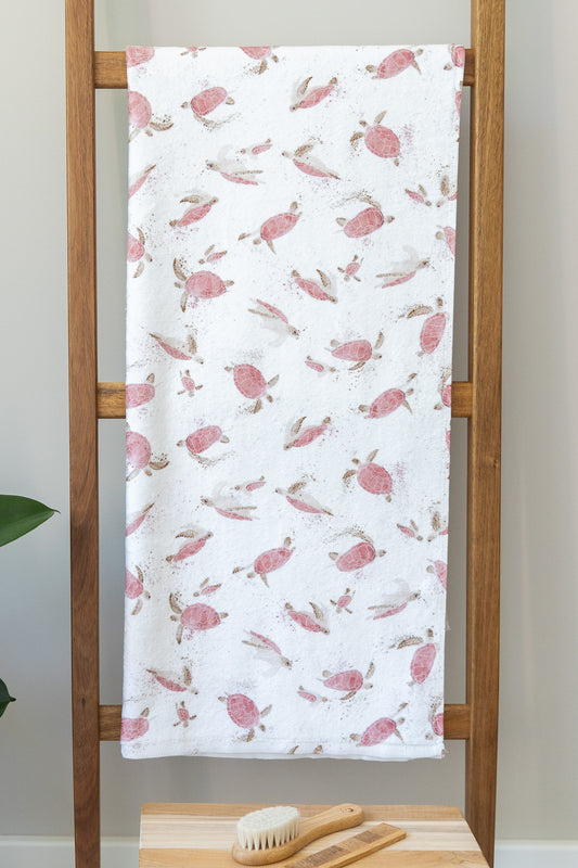 Baby terry towel with pink turtles